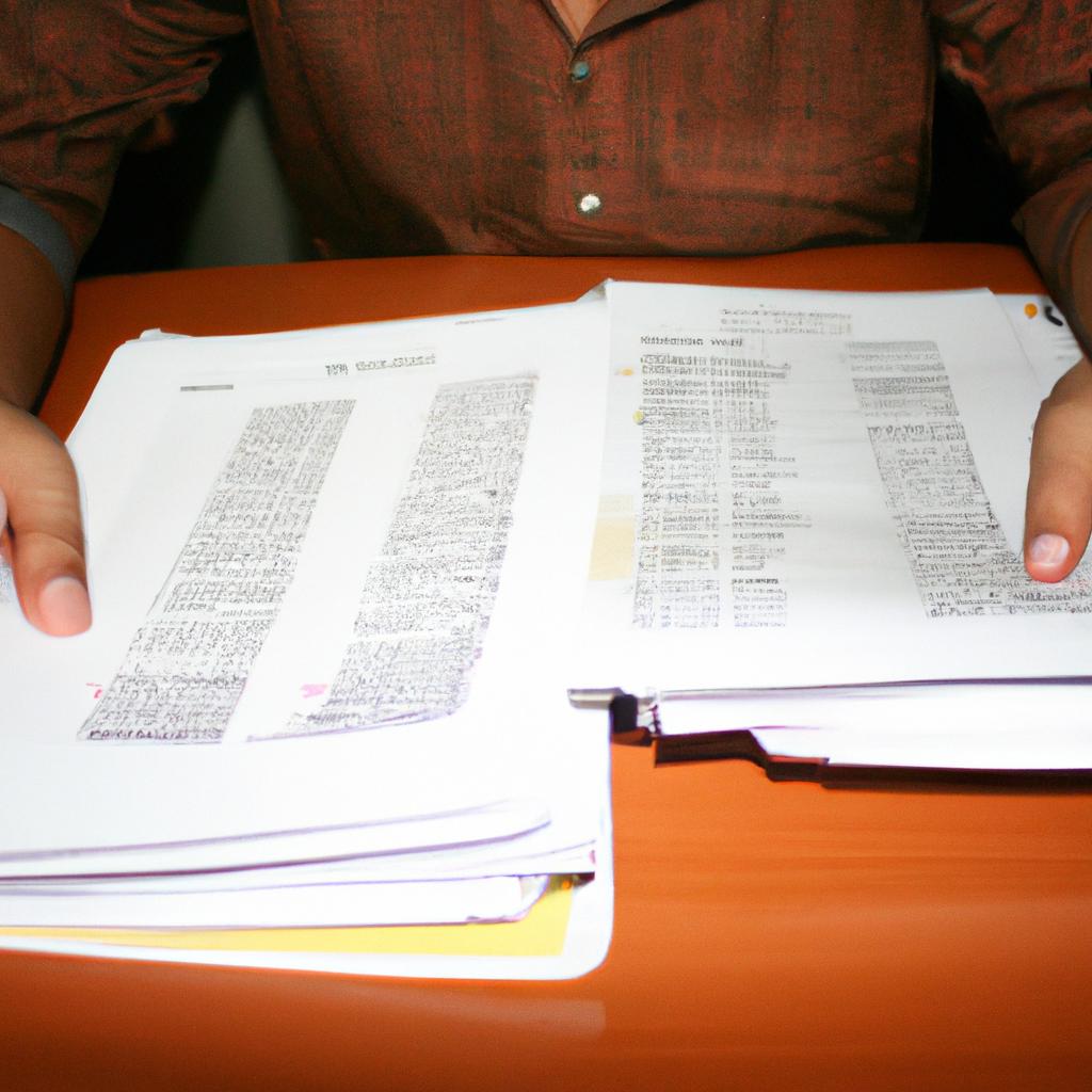 Person holding financial documents, planning